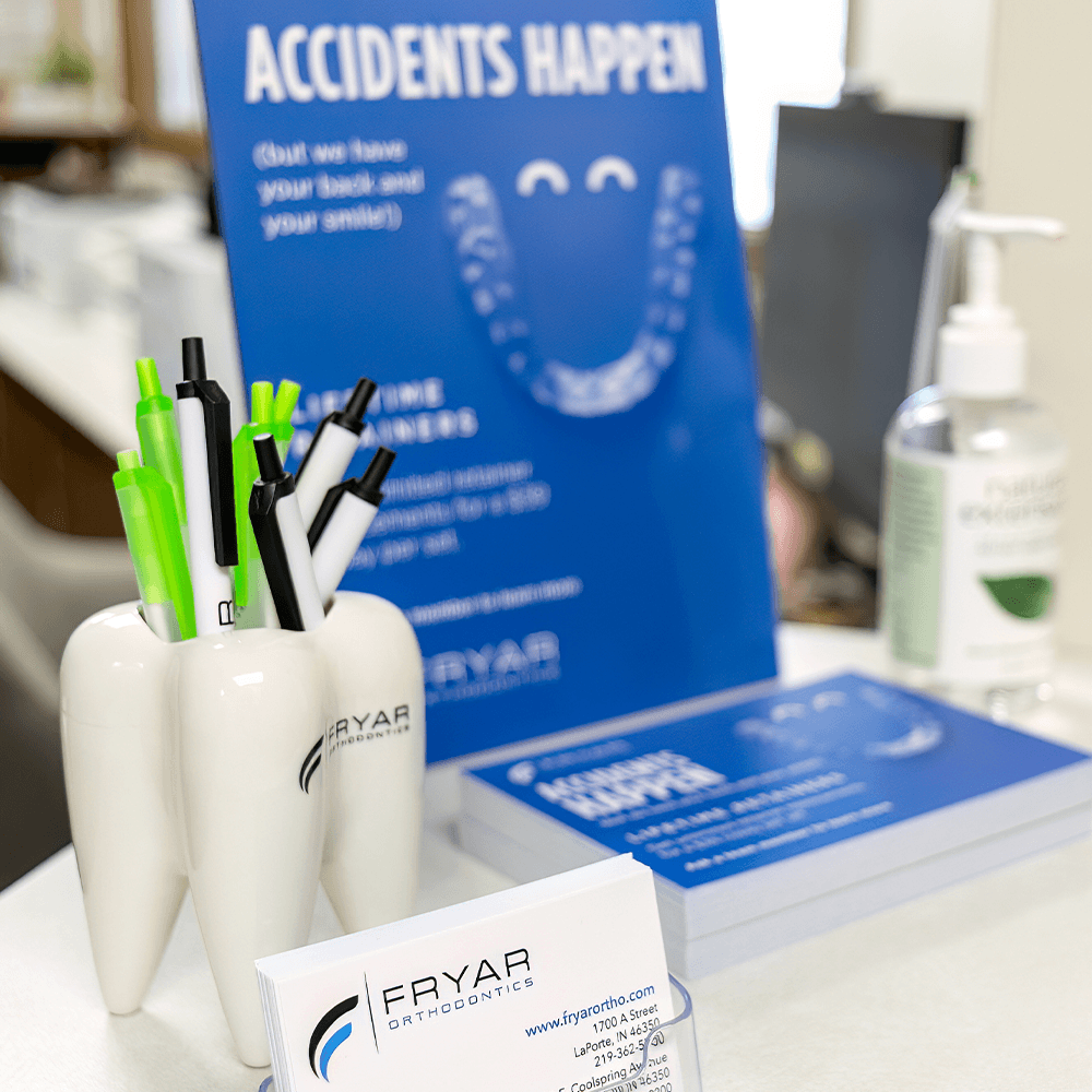 Dentist Speaking With Patient